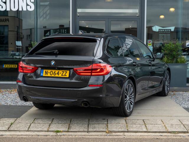 BMW 5-Serie Touring 520i High Executive / Pano / HUD / ACC / CarPlay / Stoelverwarming