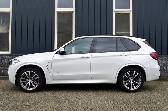 BMW X5 xDrive50i High Executive 7p. Rijklaarprijs-Garantie Panorama dak Leder Navigatie Head-up 20 Inch