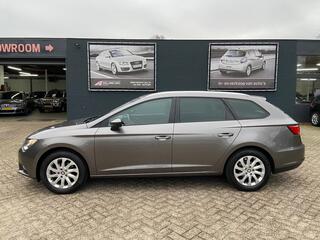 SEAT LEON ST 1.2 TSI Style - Geheel dealer onderhouden - Airco ecc - Cruise - Bluetooth/handsfree - Navigatie - Pdc - L.m velgen