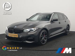 BMW 3-SERIE Touring 330e M Sport PHEV 293pk Dealer O.H. Dravitgrau | Head Up | Camera | Laser LED | Sfeerverlichting | Lederen Sportstoelen & Stuur Verwarmd | Apple Carplay | Keyless | Blis | 19