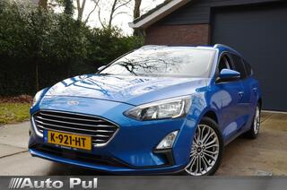 FORD FOCUS Wagon 1.0 EcoBoost Hybrid Titanium X Business Navi/Pdc/Ecc/Achteruitrijcamera/Stuur Ruit&Stoelverwarming/Led/Rijstrooksensor met correctie/Elektrisch bedienbare achterklep met sensorsturing
