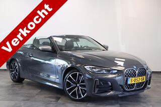 BMW 4-SERIE Cabrio M440i xDrive High-Executive 374PK Individueel-lak Navigatie  Volleder 19LMV Head up