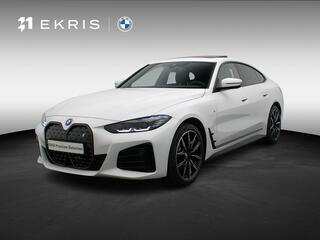 BMW i4 eDrive40 M Sportpakket Pro | Stuurwielrand Verwarmd | Achteruitrijcamera | Schuifdak | DAB | HiFi | 19''