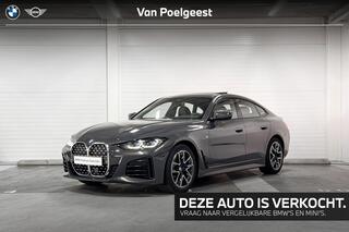 BMW 4-SERIE Gran Coup� 420i Business Edition Plus | Comfort Access | Schuif-/kanteldak | Stoelverwarming | Parking Assistant | Head-Up Display | HiFi