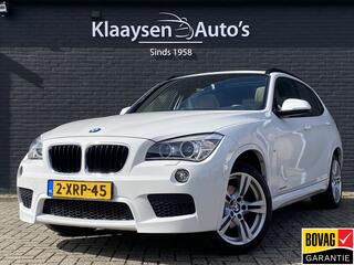 BMW X1 sDrive20i High Executive 184 pk AUT. | panoramadak | navigatie | trekhaak | beige leder interieur | sportstoelen
