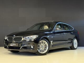 BMW 3-SERIE GT Gran Turismo 320i Luxury | Panoramadak | Leder | Carplay | Navi | Stoelverwarming