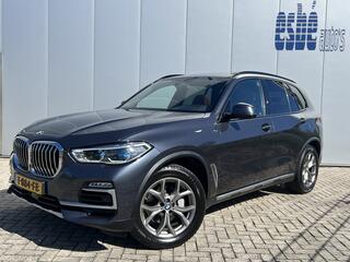 BMW X5 xDrive30d High Executive X-Line Luchtvering Individual Tartufo leder Trekhaak 3500 kg Panoramadak Laser licht Koplampen Head-Up Display Harman Kardon Audio Rondzicht Camera Vol Opties Lage Kilometerstand