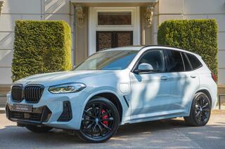 BMW X3 xDrive30e High Executive TREKHAAK | PANO | 360 CAM | ADAPTIVE | H&K | HUD