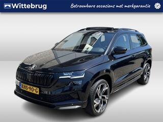 SKODA Karoq 1.5 TSI ACT Sportline / AUTOMAAT/ PANO/ TREKHAAK/ DCC/ STUUR+STOELVERWARM./ ACC/ PARK.SENSOR.V+A/ CAMERA/ SMARTLINK/ KEYLESS/ DIGITAL DASH/ NAVI/ DAB/ CLIMA/ LED/ 19'' LMV