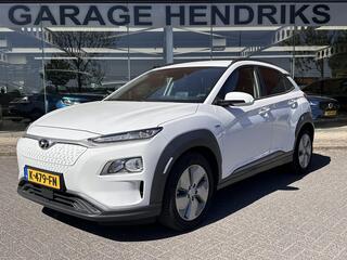 HYUNDAI Kona EV Fashion 64 kWh | SOH: 96,7% | Lage kmstand | 3 Fase | Warmtepomp | Blindspot |