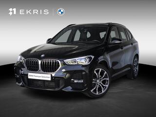 BMW X1 sDrive18i | M Sportpakket | Achteruitrijcamera | Panoramadak | Stoelverwarming | Head-Up Display | PDC | 19''