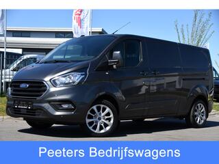FORD TRANSIT CUSTOM 300 2.0 TDCI L2H1 Limited Camera, Cruise, Carplay, 2 x Schuifdeur, Trekhaak, 130pk, Stoelverwarming, Multimedia, Uniek!