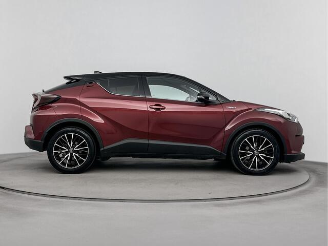 Toyota C-HR 1.8 Hybrid Style Bi-Tone Limited | Trekhaak | Stoelverwarming | Navigatie | Blind Spot |