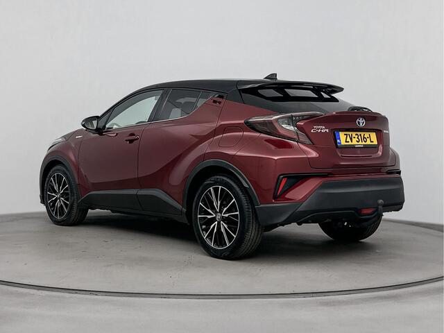 Toyota C-HR 1.8 Hybrid Style Bi-Tone Limited | Trekhaak | Stoelverwarming | Navigatie | Blind Spot |