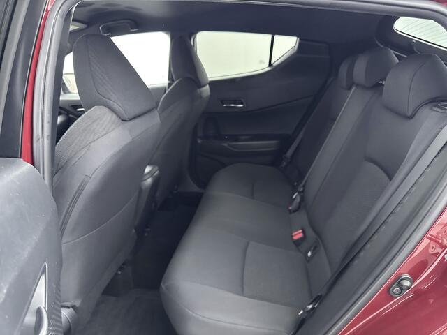Toyota C-HR 1.8 Hybrid Style Bi-Tone Limited | Trekhaak | Stoelverwarming | Navigatie | Blind Spot |