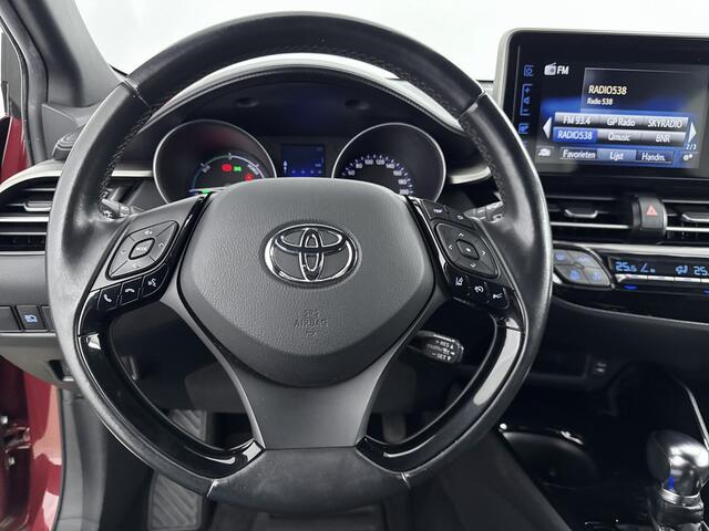Toyota C-HR 1.8 Hybrid Style Bi-Tone Limited | Trekhaak | Stoelverwarming | Navigatie | Blind Spot |