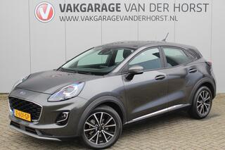 FORD PUMA 1.0-125pk EcoBoost Mild-Hybrid Titanium. Fabrieksgarantie t/m 21-05-2027 ! Slechts 14.800km ! Volautm. airco, pdc achter, all season banden, stoel-, stuur- en voorraamverw., navigatie, telefoonvoorb., elektr. achterklep, cruise cntrl, keyless entry&go etc