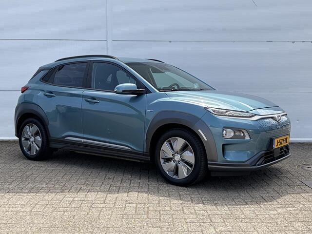 Hyundai Kona EV Premium 64 kWh SOH 100 % 1 Fase / Lichtmetalen velgen 17 / Cruise control adaptief met Stop&Go en stuurhulp / Airco automatisch /