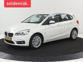 BMW 2-SERIE Active Tourer 218i Luxury Line | Leder | Camera | Trekhaak | Full LED | Navigatie | Parkeerhulp | Climate control | Bluetooth | Cruise control