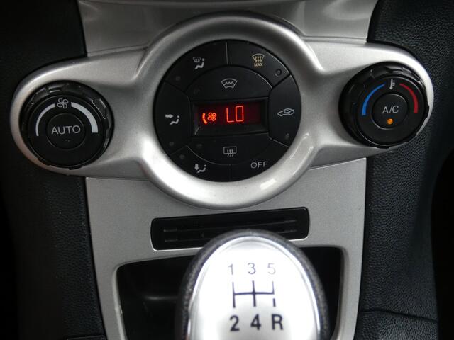 Ford Fiesta 1.25 Titanium|Airco|Leer|5 Deurs|LM-Velgen|Nw.APK|Getinte Ramen|Cruise Control..