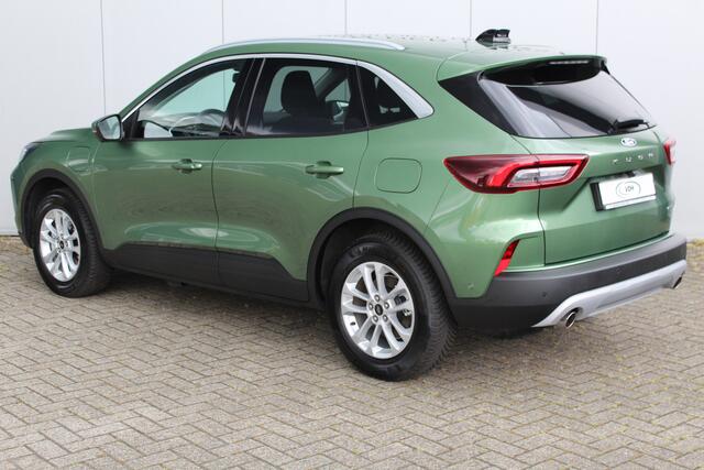 Ford Kuga 2.5-243pk PHEV Titanium. Hybride rijden voor een re�el bedrag. Slechts 11.500km  Autm. airco dual, camera v+a, metallic lak, all season banden ro