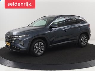 HYUNDAI TUCSON 1.6 T-GDI HEV Comfort | Trekhaak | Stoelverwarming | Adaptive cruise | Carplay | Camera | Navigatie | Keyless | Full LED | 17'' | Parkeerhulp | Climate control | Digital Cockpit