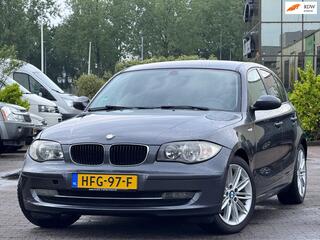 BMW 1-SERIE 116i High Executive | 17 inch | Airco | Stoelverwarming | 2 sleutels | Getint ramen | elektrische spiegels | Onderhoud
