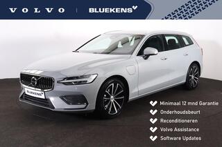 VOLVO V60 T6 Recharge AWD Essential Bright - IntelliSafe Assist & Surround - Parkeercamera achter - Verwarmde voorstoelen, stuur & achterbank - Parkeersensoren voor & achter - Inklapbare trekhaak - 18' LMV